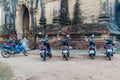 BAGAN, MYANMAR - DECEMBER 7, 2016: E-bikes electric scooters parked in front of Thitsarwadi Thisa wadi in Bagan, Myanm Royalty Free Stock Photo