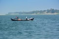 BAGAN, MYANMAR - FEBRUARY 2, 2016: Local people crossing Ayeyarwaddy river on boat Royalty Free Stock Photo