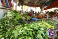 BAGAN, MYANMAR: FEBRUARY 21, 2015 : Local women sell their produce at an outdoor market in Bagan on February 21, 2015. The market