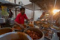 Nasi kandar food seller at stall in business