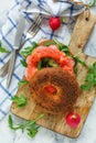 Bagel with cumin, arugula, radish and smoked trout. Royalty Free Stock Photo