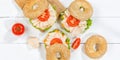 Bagel sandwich with chicken ham for breakfast from above panorama Royalty Free Stock Photo