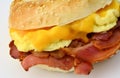 Bagel with scrambledd egg, bacon and cheddar cheese