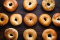 Bagels arranged on kitchen table in flat lay photo, breakfast variety