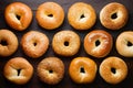 Bagels arranged on kitchen table in flat lay photo, breakfast variety