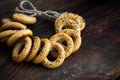 Bagels with with poppy seeds on a wooden board