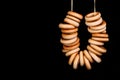 Bagels on rope over black