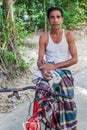 BAGERHAT, BANGLADESH - NOVEMBER 16, 2016: Local man with a bicycle in Bagerhat, Banglade