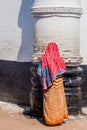 BAGERHAT, BANGLADESH - NOVEMBER 16, 2016: Muslim woman at the wall of Khan Jahan Ali tomb in Bagerhat, Banglade