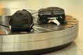 Baggage on conveyor belt at the airport. Abstract luggage line Royalty Free Stock Photo