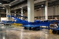 Baggage claim area with empty baggage carousels