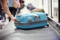 Baggage claim luggage conveyor belt at airport Royalty Free Stock Photo