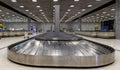 Baggage conveyor belt at the airport. Empty luggage claim line in airport Royalty Free Stock Photo