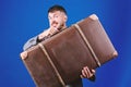 Baggage insurance. Man well groomed bearded hipster with big suitcase. Take all your things with you. Heavy suitcase Royalty Free Stock Photo