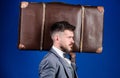 Baggage insurance. Travel and baggage concept. Man well groomed bearded hipster with big suitcase. Take all your things Royalty Free Stock Photo