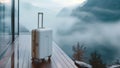 Baggage on retreat hotel balcony perched in misty mountains