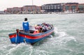 Baggage transfer by boat in Venice, Italy