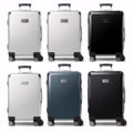 Baggage travel mockup, closed plastic luggage concept, front and side view.