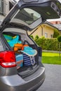 Baggages in the car trunk packed and ready to go for holidays Royalty Free Stock Photo