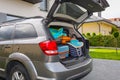 Baggages in the car trunk packed and ready to go for holidays Royalty Free Stock Photo