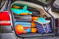 Baggages in the car trunk packed and ready to go for holidays Royalty Free Stock Photo