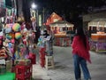 kashmiri shawls, toys and clothing for sale in a local shop outside Bahu Fort in Jammu, India