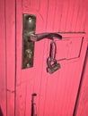 Part of pink metal door