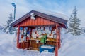 Bagnsasen, Norway - April, 02, 2018: Outdoor view of wooden red hut estructure with papers and nformative signs inside Royalty Free Stock Photo