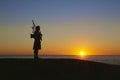 Bagpipe player silhouette sunset Royalty Free Stock Photo