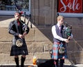 Bagpipe players in a street of Edinburgh - Scotland