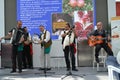 Bagpiper, guitarist, accordion and tambourine players from Sicily at the EXPO Milano 2015.