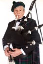 Bagpiper in tartan Royalty Free Stock Photo