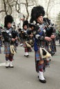 Bagpipers of Nassau Police Pipes and Drums marching at the St. Patrick's Day Parade Royalty Free Stock Photo