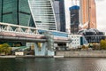 Bagration Bridge over the Moscow river on the background of Moscow International Business Centre MIBC. Russia. Royalty Free Stock Photo