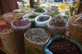 Bags with Arabic spices outside a store at the Souq Waqif, Doha. Qatar