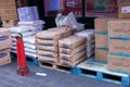 Bags of food stocked on the pallets at the bazzar for sell en gros