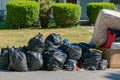 Bags of Garbage at Curb