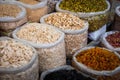 Bags of nuts, seeds and raisins, food ingredients on market Suq, Damascus