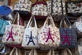 Bags with Paris logo on sale in Montmartre souvenir shop in Paris, France Royalty Free Stock Photo