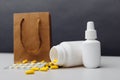 Bags with pills and drugs on the table. Buying medicines online concept
