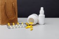 Bags with pills and drugs on the table. Buying medicines online theme
