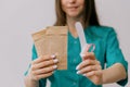 Bags for the sterilization of instruments in the hands clad in sterile gloves Royalty Free Stock Photo