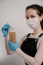 Bags for the sterilization of manicur instruments in the hands clad in sterile gloves Royalty Free Stock Photo