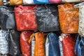 Bags, suitcases, purses and scarfs in shop of leather goods and accessories