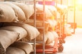 Bags in the warehouse on the racks. Coffee, arabica, rice