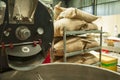 Bags in the warehouse on the racks. Coffee arabica, rice. Royalty Free Stock Photo