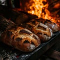 Baguette on the fire with flames. Selective focus. Royalty Free Stock Photo