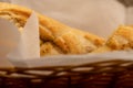 Baguette with garlic paste cut into pieces, close-up, selective focus Royalty Free Stock Photo