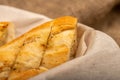 Baguette with garlic paste cut into pieces, close-up, selective focus Royalty Free Stock Photo