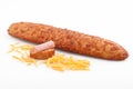 Baguette with ham and cheese on a white background